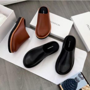 JW Anderson Babouche Mules in Brown and Black