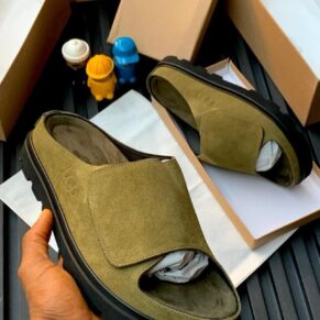The UGG GoldenCoast Suede Slide in Moss Green